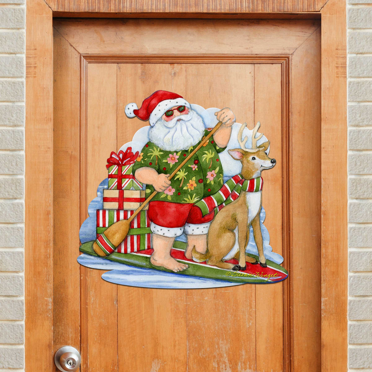 Paddle boarding Santa