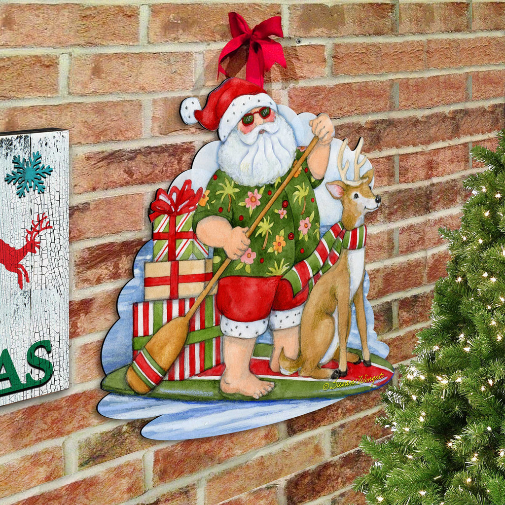 Paddle boarding Santa